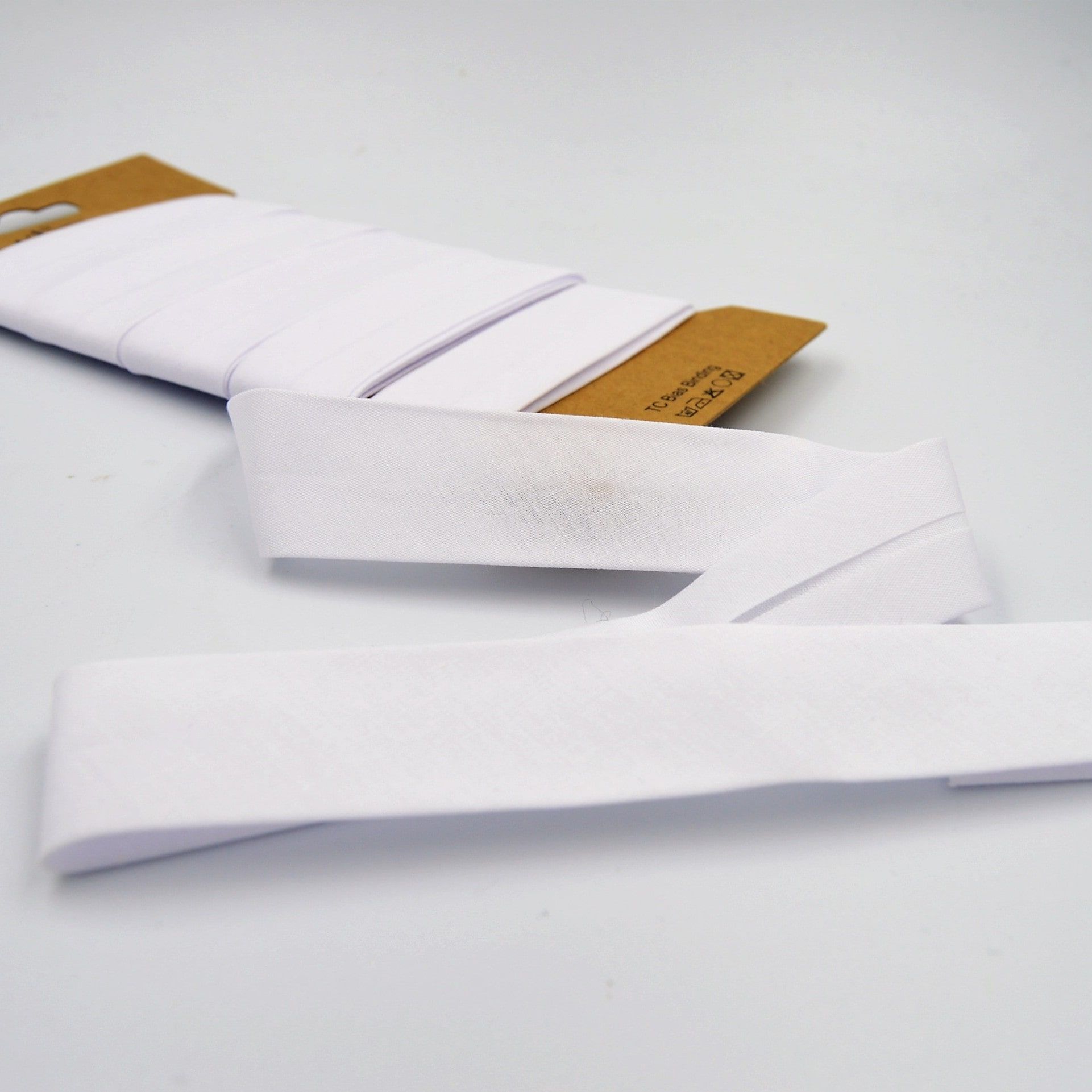 Trimz poly-cotton bias binding 25mm 5m white card
