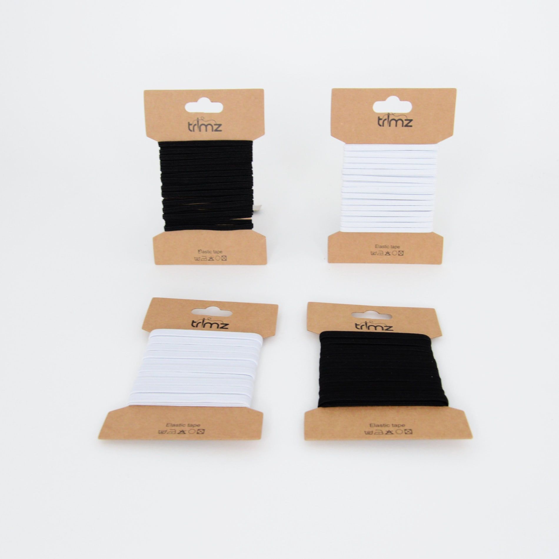 Trimz braided elastic on a card 2 black/ 2 white group shot